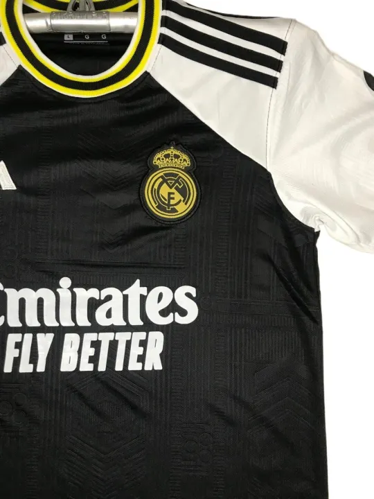 Real%20Madrid%20(With%20Embroidery)%20Premium%20Football%20Jersey%20Black%202023/24%20-%20Golden%20-%20Full%20Sleeve%20-%20Image%204