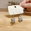 Douyin step by step, Chinese style, Ping An lock ear buckles, female tassels, bell earrings, temperament, light luxury earrings.