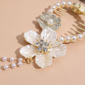 New Temperament Retro CamelliaTassel Fixed Plate Hair Artifact Pearl Ponytail Hair Clips Back Head Decorative Hair Accessories.
