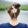 New Temperament Retro CamelliaTassel Fixed Plate Hair Artifact Pearl Ponytail Hair Clips Back Head Decorative Hair Accessories.