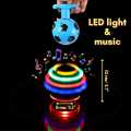 LED Light Up Flashing Spinning Music Gyro Spinner Football Toy. 