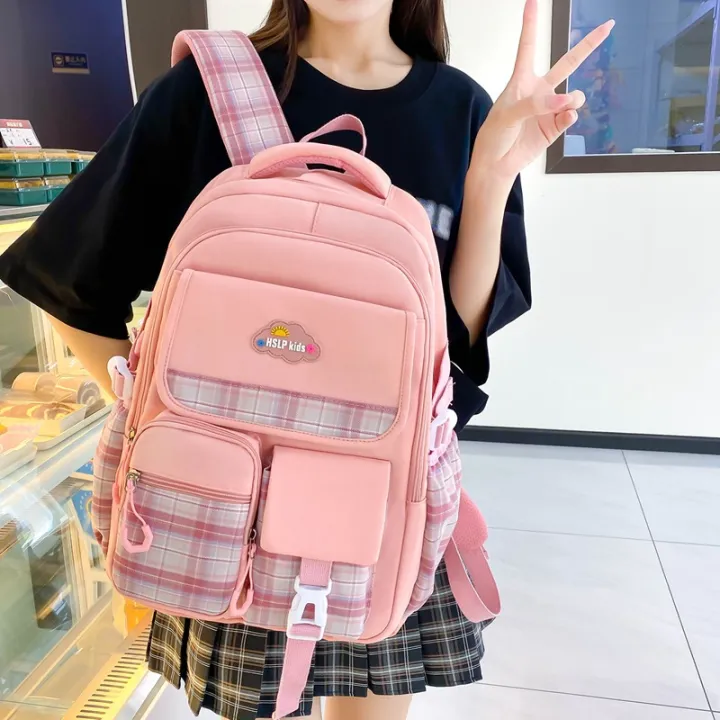 New children's school bag for primary school students 3-6 grade checkered color-blocking, ultra-lightweight burden reduction spine protection backpack for foreign trade