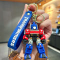 Cartoon Movie Transformer Key Chain Optimus Prime bumblebee robot Key Chains Silicone Car Key Chain Bag Pendant Keyring Friends.