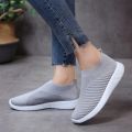 【Deal】 Summer New Lightweight Flying Large Size Socks Shoes Women Breathable Mesh Casual Flat Bottom Comfortable Women's Shoes.