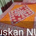 Red & orange colour combined mombatic bedsheets. 