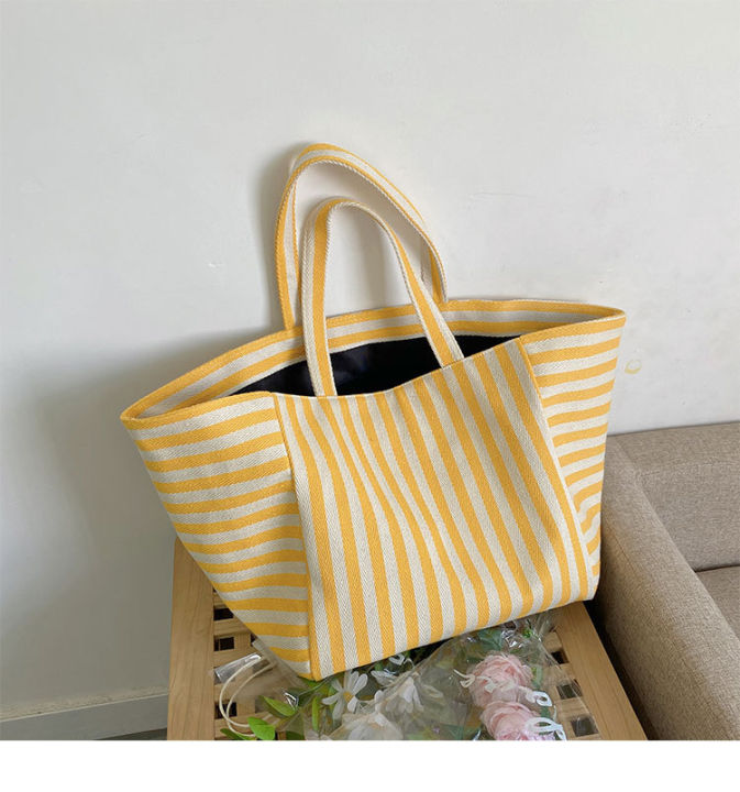 Canvas%20bag%20women's%20ins%20one-shoulder,%20large-capacity,%20lazy%20wind,%20striped%20fashion,%20big%20bag,%20casual%20literary%20hand-tote%20bag%20women%20-%20Image%207