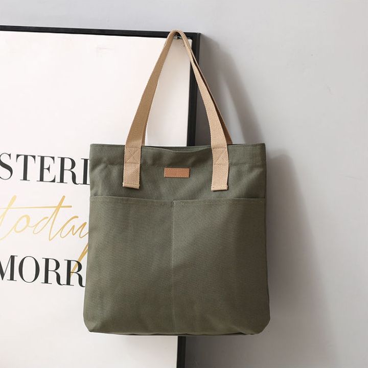 TAG Lifestyle Canvas Tote Bag/Fashionable Top Handle Olive Green Color With 2 Big Outside Pocket and Zipper Enclosure for girls For University/College/Trendy Fashionable Women