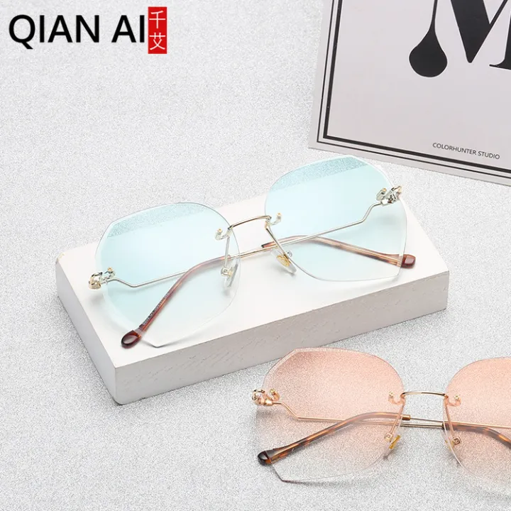 Qianai%20new%20fashion%20hipster%20cut%20edge%20sunglasses%20women's%20irregular%20fashion%20rimless%20ocean%20piece%20sunglasses%20driving%20mirrors%20-%20Image%202