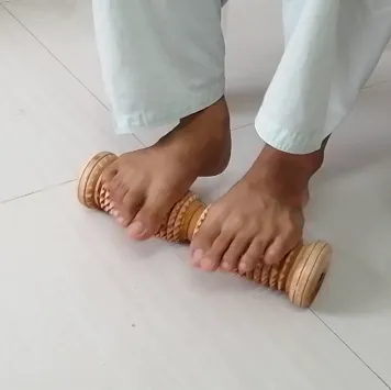 Foot%20Roller%20Massager%20-%20Acupressure%20Wooden%20Tools%20for%20Pain%20Relief%20and%20Relaxation%20%7C%20Wooden%20foot%20roller%20%7C%20Durable,%20Eco-Friendly,%20and%20Easy%20to%20Use%20%7C%20Wooden%20Footrest.%20-%20Image%202