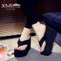 High heeled slippers for women in summer, thick soled herringbone beach shoes, sloping heels, clip on sandals, and sponge shoes. 