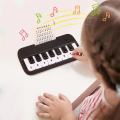 Mini Pocket Piano 15 Keys Simulation Electronic Piano Toy Teaching Musical Instrument White. 