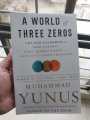 A World of Three Zeros by Muhammad Yunus (Premium Quality - Paperback). 