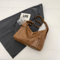 Retro fashion versatile large capacity bag women's new double pocket winter commuter tote bag niche shoulder bag.