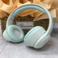 New cross-border macaron CXT-01 head-mounted wireless bluetooth headset foldable telescopic factory direct wholesale.