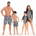 2024 Cross-border European and American parent-child swimsuit family wear new mother and daughter bikini father and son beach pants elastic waist swimsuit.