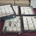 Safely store your watche Box in a 12-slot wooden clock box with leather finish, keeping your timepieces fashionable and maintained..