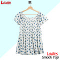 Women's Smocked Floral Printed Top Round neck Short sleeves Smock T-Shirt for Ladies from Levin. 