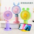 Rechargeable Stylish Cartoon Shape Mini Turbo Fan With Mobile Holder For Indoor & Outdoor Use -  Multicolor. 