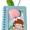 IR Stationeries graphic spiral mini pad with ruling 65 pages and peach silicon toy. 