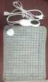 Electric Heating Pad.