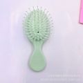 Mini children's airbag cushion massage generous curly hair sandalwood large curved cream glue DIY small comb home. 