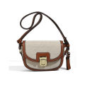 2024 New Korea ins niche contrast one-shoulder crossbody saddle bag Trendy retro versatile underarm bag for girls.