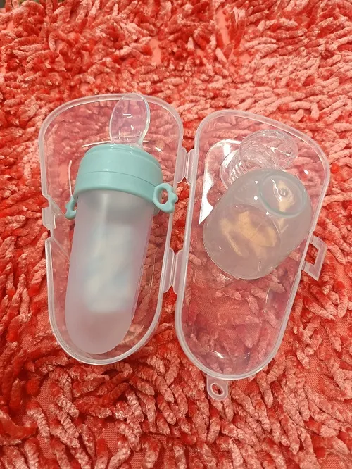 Infant%20Baby%20Safety%20Kids%20Silicone%20Feeding%20Spoon%20Feeder%20Food%20Rice%20Cereal%20Bottle%20Essential%20(2%20in%201%20Khichuri%20Bottle%20+%20Fruits%20Juicer%20Nipple%20with%20Box)%20-%20Color%20as%20per%20stock%20-%20Image%205