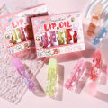 6Pcs Lovely Animals Lip Oil Set Moisturizing Plumper Transparent Lip Gloss Clear Lip Glaze Winter Liquid Roll-On Lip Balm Liquid. 