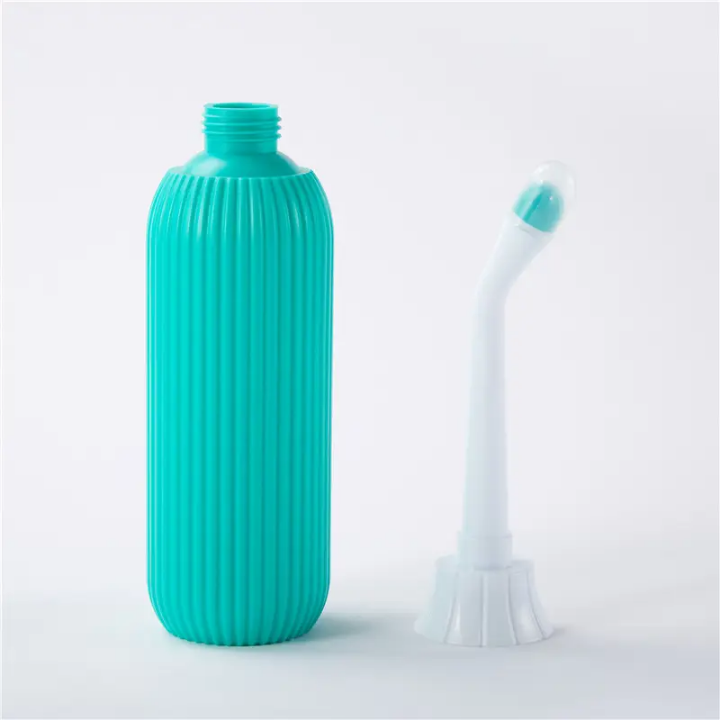 Hygiene-Friendly%20Portable%20Bidet%20spray%20bottle%20with%20Dual-Nozzle%20Design%20and%20Retractable%20Nozzle,%20Space-Saving,%20Travel-Friendly%20Feminine%20Hygiene%20Care%20500%20mL%20-%20Image%203
