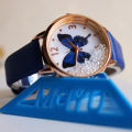 Elegant Women's Leather Watch with Lucky Beads and Butterfly Design.