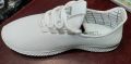 School shoes for boys with soft rubber sool and white.