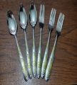 Stainless Steel 3 + 3 Spoon + Fork Set - 6  Pcs Multi Design Silver with Golden Shade. 