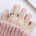 Net red Tiktok titanium steel frosted female lovers rose gold pressed sand pair end ring index finger ins jewelry. 