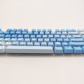 Gradient translucent keycapsPBT dip dyeing words transparent simplicity personality fresh mechanical keyboard frost blue rainbow keycaps. 