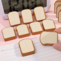 A Bag of Cute 3D Replica Toast Bread Shaped Children's Eraser Set.