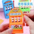 Mini lottery machine winning game console children's puzzle toy desktop game. 