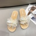 Soft sole non-slip wear sweet girl sandals 2024 new summer bow flat fashion and versatile beach shoes. 