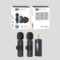 The new one-in-two wireless lavalier microphone K15 three-in-one K9 live radio noise reduction microphone is universal for mobile phones.