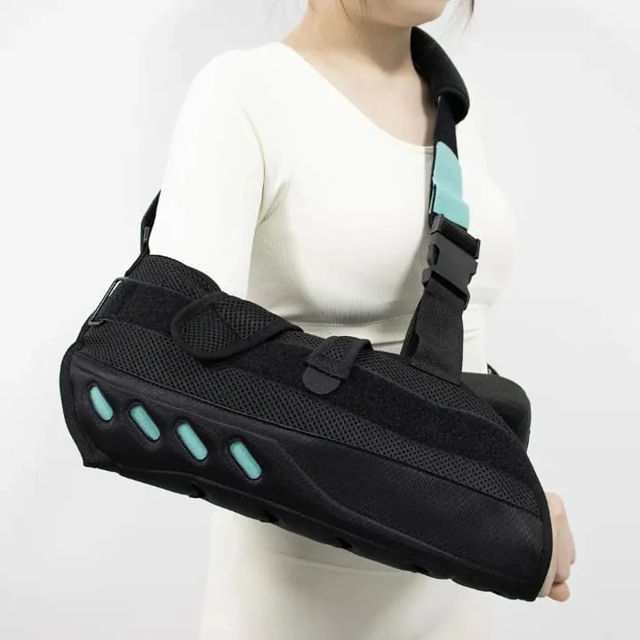 Universal%20Shoulder%20Abduction%20Arm%20Sling,%20Medical%20Support%20Brace,%20Black%20with%20Turquoise%20Accents%20%7C%20UM%20C-17%20-%20Image%203