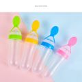 Silicon Baby Food feeder bottle rice cereal with soft squeeze spoon (Multicolour)-China.