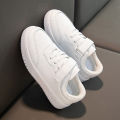 Children's school performance small white shoes velcro soft-soled sneakers spring and autumn boys and girls low-top casual shoes.