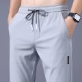 Summer thin casual pants, quick-drying loose fit large size straight pants, stretch durable sports ice silk pants men.