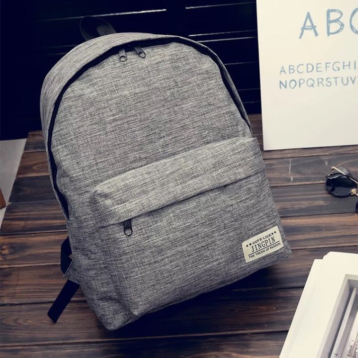 Korean version of the college style backpack, the new bag, the primary and secondary school students' school bag, the travel solid color backpack, one drop-shipping