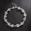 AliExpress 12 Pieces Rubik's Cube Bracelet Silver-Plated Checkered White Diamond Colored Diamond Bracelet Foreign Trade Wholesale. 