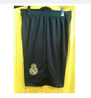 Real%20Madrid%20black%20Shorts%202023/24%20-%20Comfortable%20And%20Stylish%20Football%20Shorts%20For%20Every%20Game%20-%20Official%20Merchandise%20For%20Real%20Madrid%20Fans%20-%20Image%202