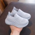 Spring and Autumn style bare plate medium and large children's shoes breathable student shoes trend casual shoes Korean version of boys and girls flying knitting shoes. 