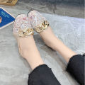 Summer new Korean version of low-heeled head metal buckle sandals half slip shoes female fashion transparent mesh half slippers. 