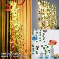 Enchanting LED Flower String Lights with Lush Green Leaves: 15 Feet of Indoor/Outdoor Fairy Lights/45. 