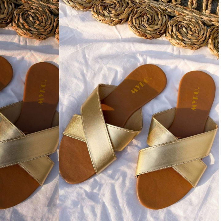 Myro Gold Cross Slides.