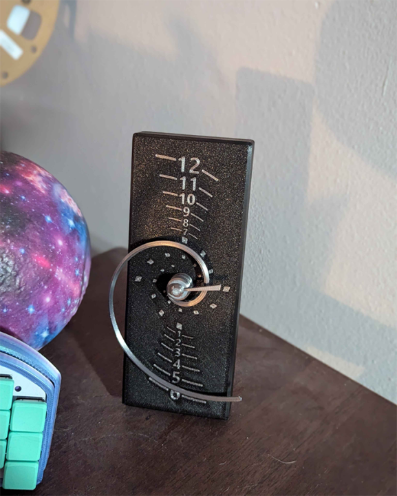 3D%20Printed%20Fibonacci%20Golden%20Spiral%20Clock%20-%20Unique%20Mathematical%20Timepiece%20with%20Ironed%20Marble%20Finish%20and%20Versatile%20Desk/Wall%20Mounting%20-%20Image%203